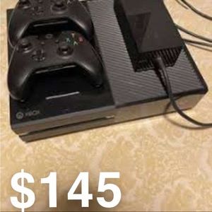 Used Xbox one with wires and controllers